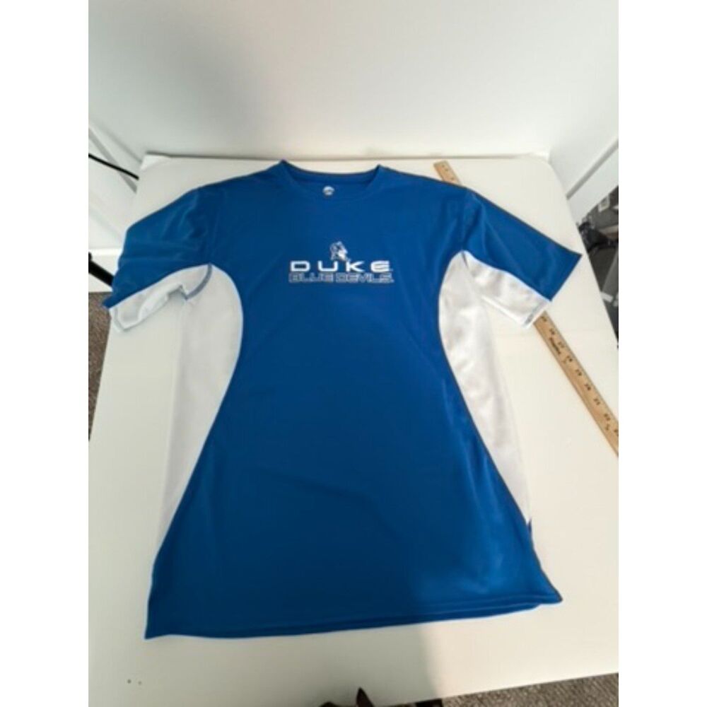 by KA inc.  LARGE dri fit tee blue/white